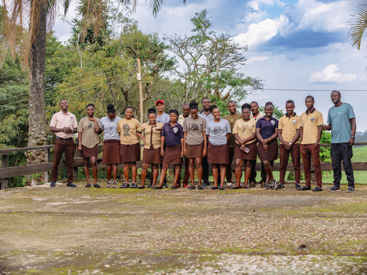 contour safaris holding uganda flag